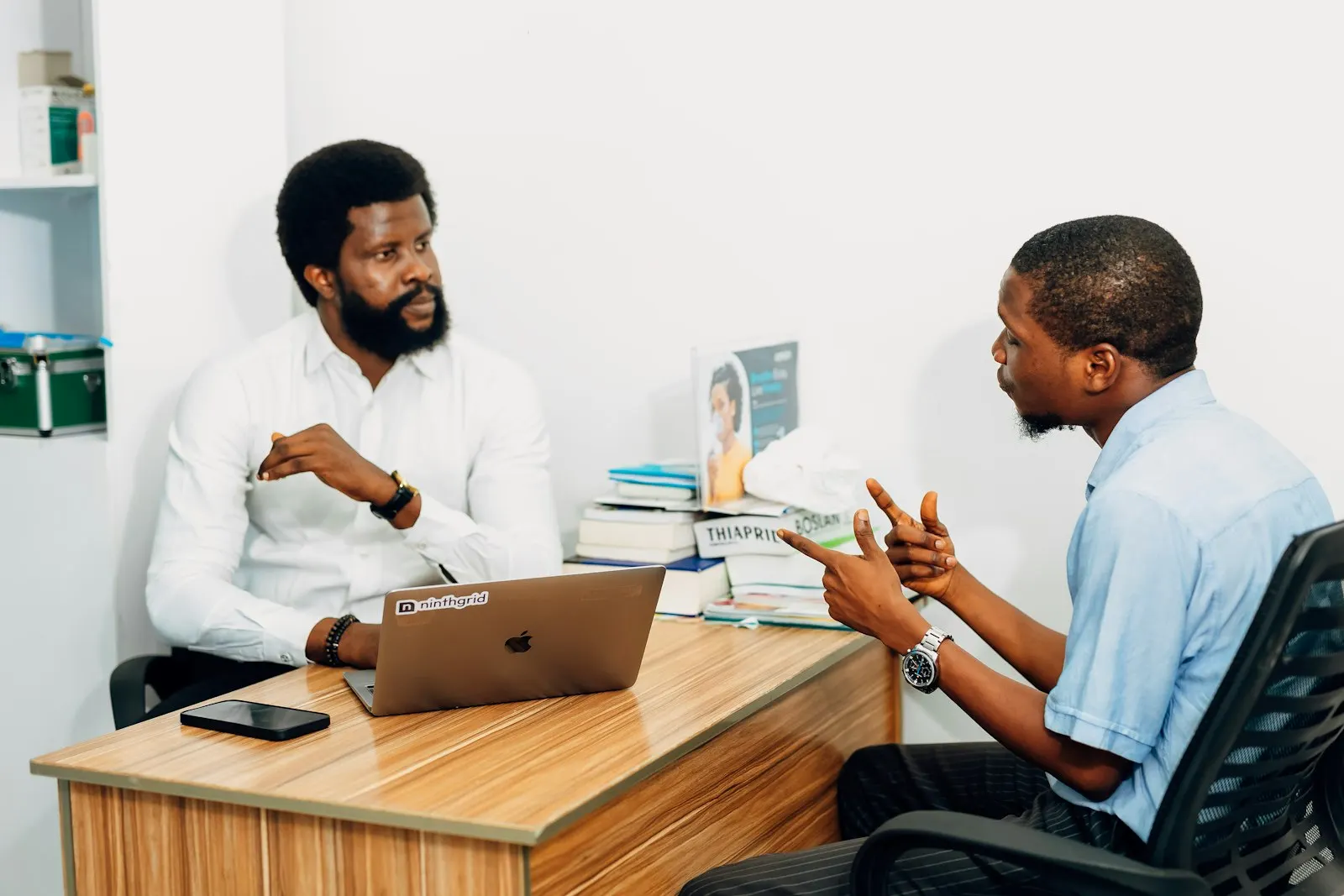 Financial consultants assisting client